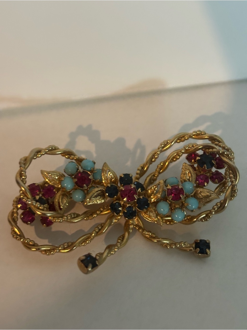 Gold-Tone Bow Brooch with Turquoise-Style, Ruby-Style and Sapphire-Style Stones